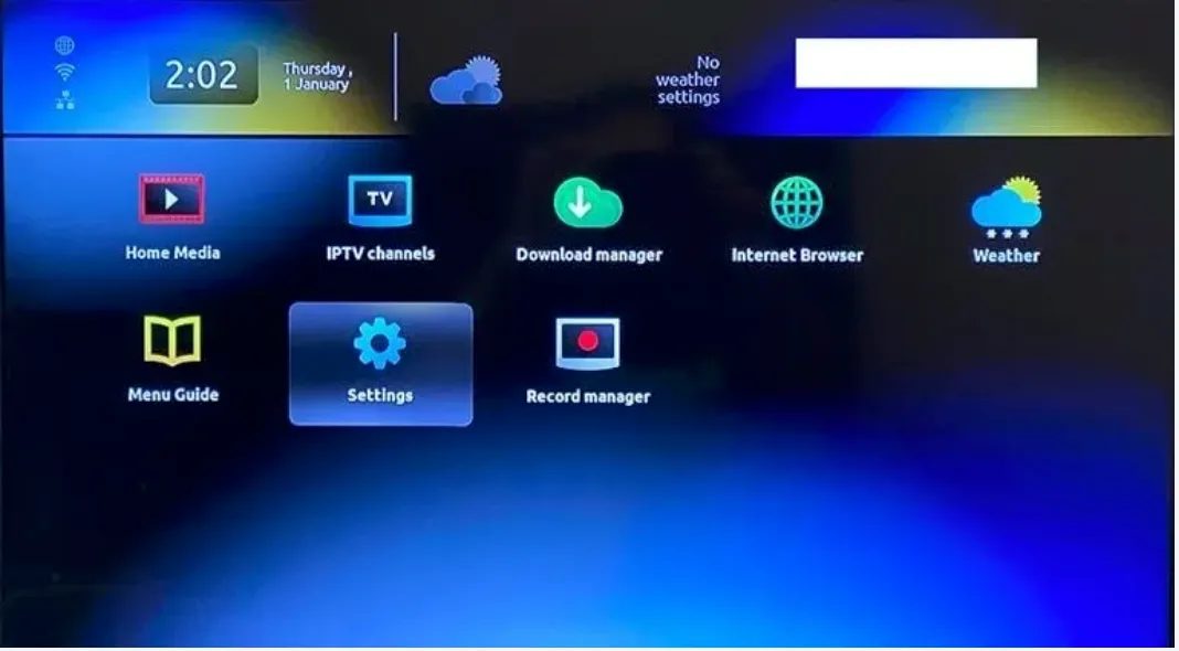 The MAG box home screen with the Settings icon highlighted