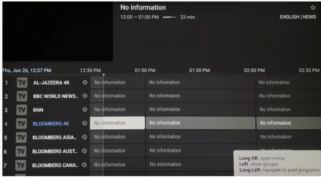 The TiviMate live TV guide with a list of channels and the programme grid